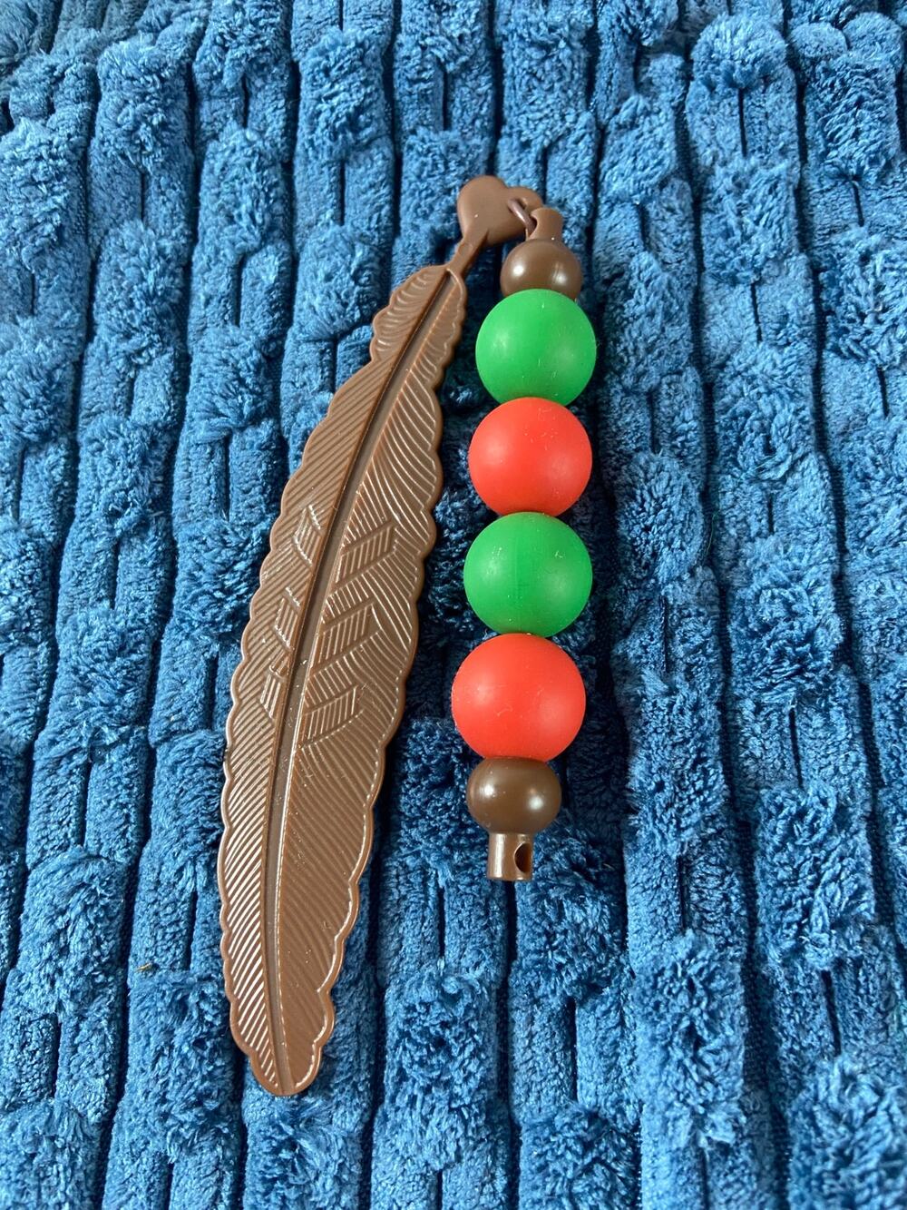 Brown feather bookmark